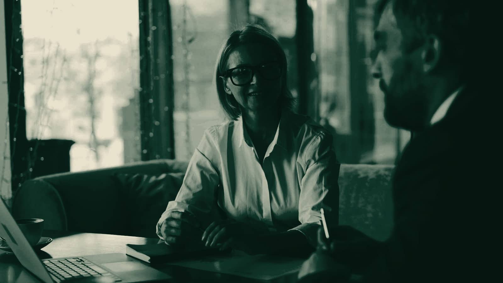 A Matrix adviser in conversation with a client