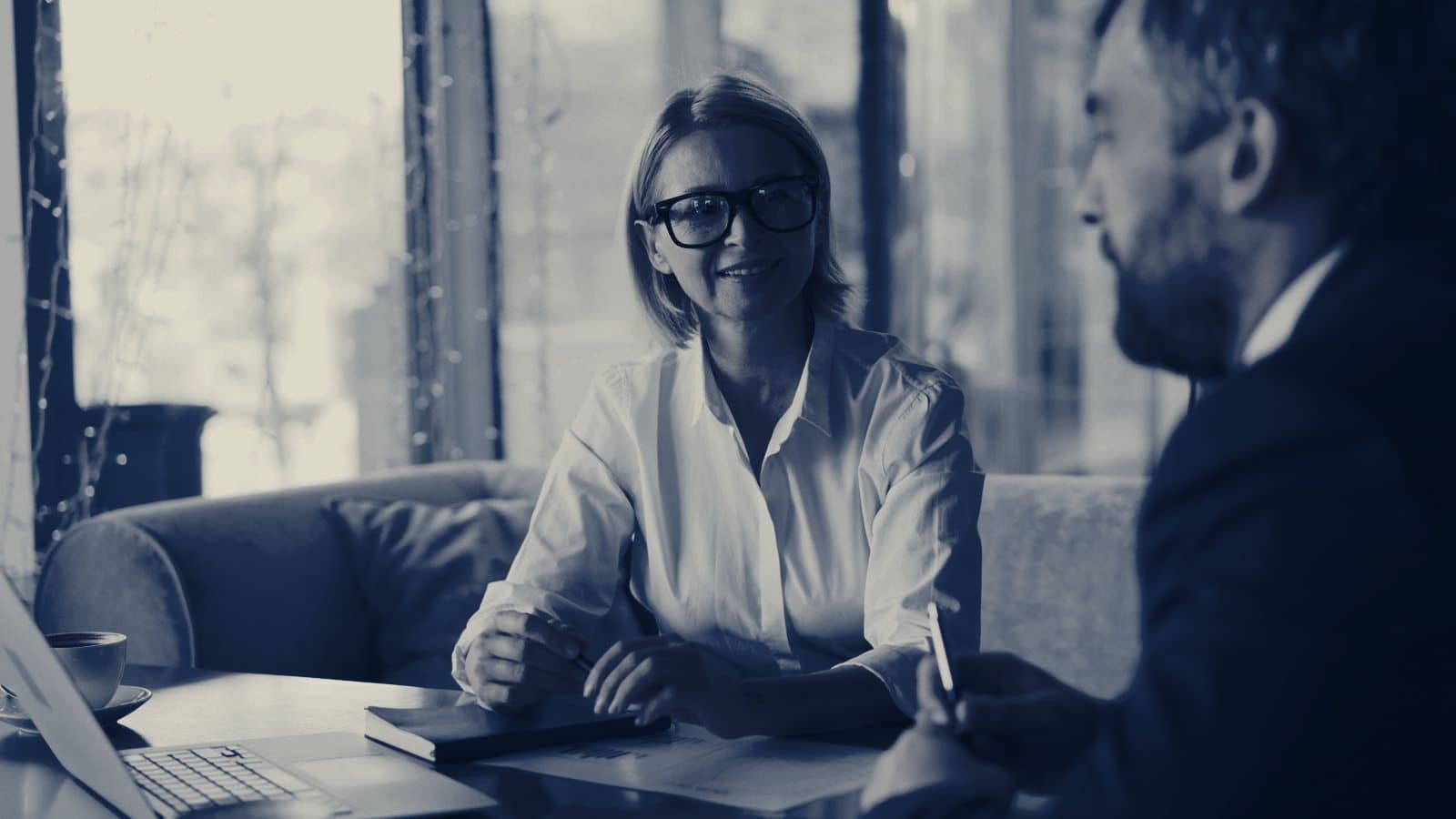 A Matrix adviser in conversation with a client