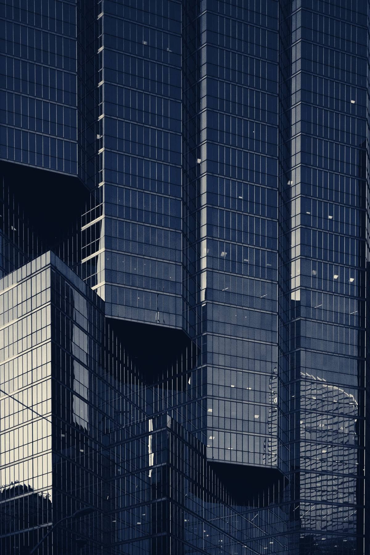 A modern tower facade at golden hour
